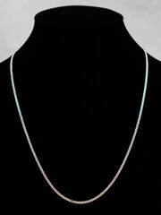 Handmade Hmong or Miao silver jewelry display on white background