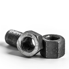 Close-up of a bolt and two nuts on a white background.