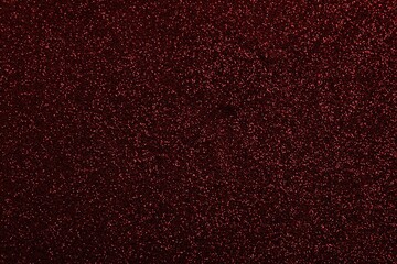 Beautiful shiny burgundy glitter as background, closeup