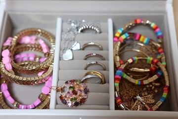 Jewelry box with beautiful bracelets and other accessories, closeup