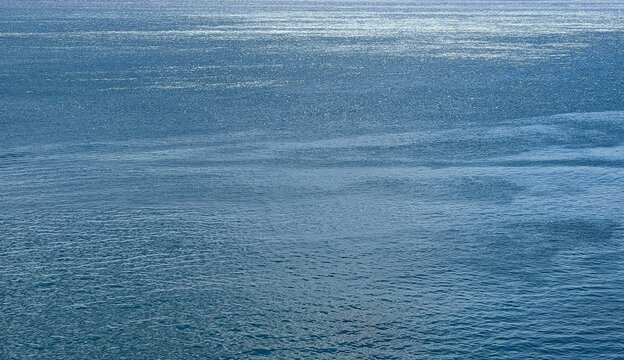Water blue calm surface. 