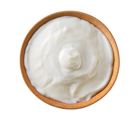 Greek yogurt or sour cream in a wooden bowl isolated on a white background, top view.
