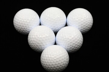 Golf balls in a pyramid shape