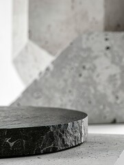 dark grey flat marble stone podium stand for cosmetics and product display on abstract grey stone background