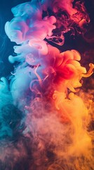 Fototapeta premium Abstract photography of vibrant colored smoke swirling and mixing in a dark studio setting