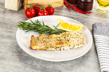 Baked salmon fish served rosemary