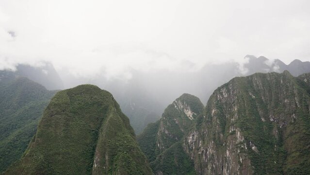 Andes Mountains from Machu Picchu. Green Peaks and Misty Day in the Andes