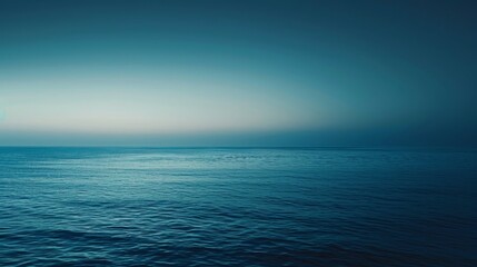 Obraz premium Blue gradient background reminiscent of twilight over ocean