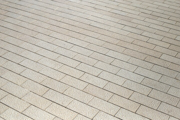 Brown tile floor walkway.Tiled courtyard