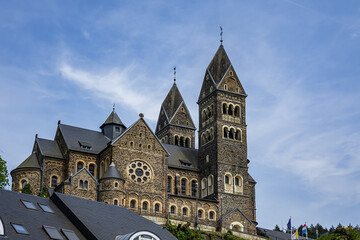 Obraz premium View of Saints Cosmas and Damian Church (Eglise Saints-Come-et-Damien) with two spires. Clervaux, Luxembourg.