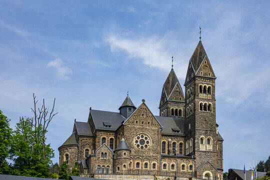 View of Saints Cosmas and Damian Church (Eglise Saints-Come-et-Damien) with two spires. Clervaux, Luxembourg.