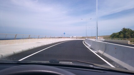 Fototapeta premium Cirkewwa, Malta 29.05.2024 - Road car ride from Cirkewwa towards Mellieha. High quality photo