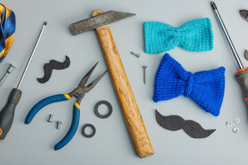 Happy Fathers Day concept. Set of manual tools, tie, spare parts, traditional symbols