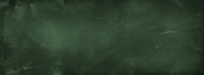 Chalk rubbed out on green chalkboard background © Stillfx