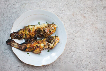 grilled fish in a plate
