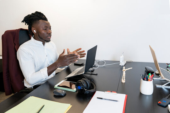 Professional man using technology in modern office