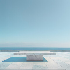 Obraz premium There is an empty square marble table in the centre of the picture with a simple, clean background and a light blue sky in the background 