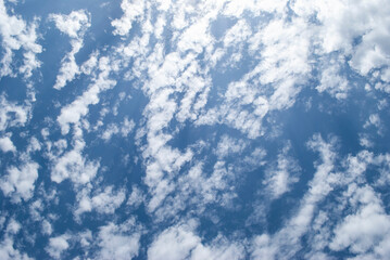 gentle clouds in the blue sky