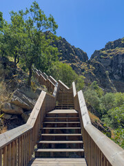 Landscape of the Mondego Walkways along the Mondego river valley with the surrounding Serra da Estrela cliffs. Caldeirao dam, Guarda, Portugal