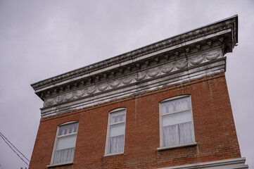 Exterior facade of an old brick builgin in Okotoks.