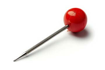 Red push pin isolated on white background.