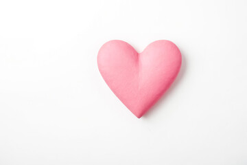 Fototapeta premium Pink heart on white background
