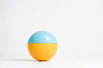 Yellow and Blue Egg on White Background