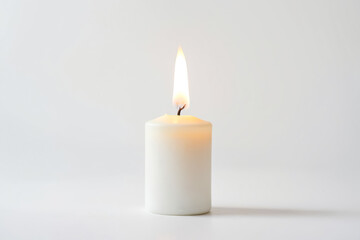 Single Burning Candle on a White Background