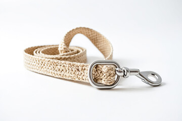 Closeup of a Beige Braided Dog Leash with a Metal Clip