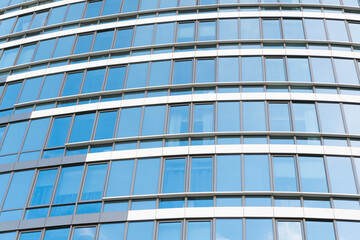 Building exterior architecture. Building background. Glass building windows. Architectural detail. Background of architecture structure. Modern urban backdrop. Glass exterior background. Architecture