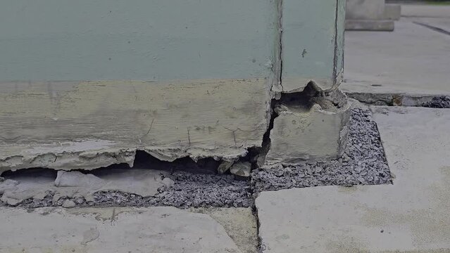 building corner reveals a significant crack, raising concerns about the structure's integrity and the quality of construction materials.