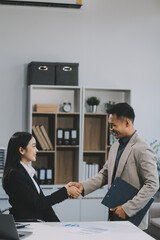 Business handshake for teamwork of business merger and acquisition,successful negotiate,hand shake,two businessman shake hand with partner to celebration partnership and business deal concept