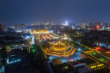 Fototapeta premium Illuminated City Skyline at Night