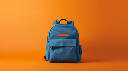 blue backpack on orange background