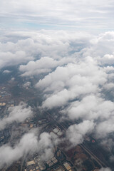 Aerial View of Cityscape Under Cloudy Sky © zhouyilu