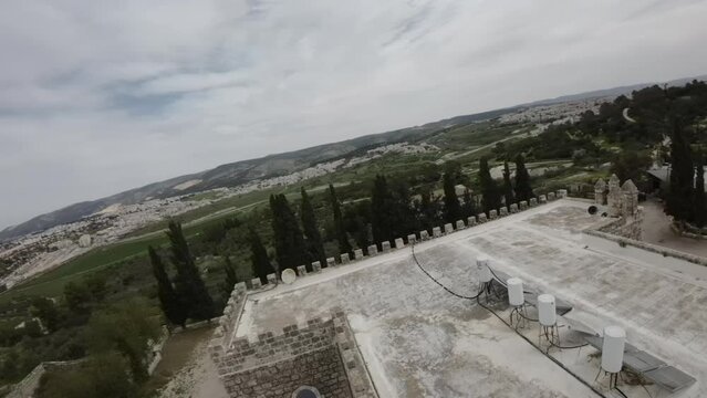 Aerial FPV video over Beit Jamal Catholic Monastery, Israel The landmark is located near Beit Shemes