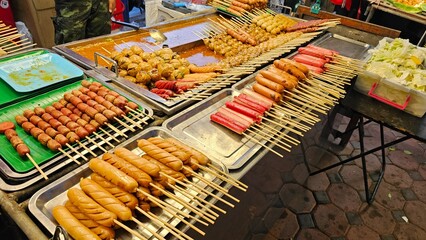 Famous street food in Thailand, grilled meatballs, fried meatballs, grilled s Thailand highlights, Thailand tour