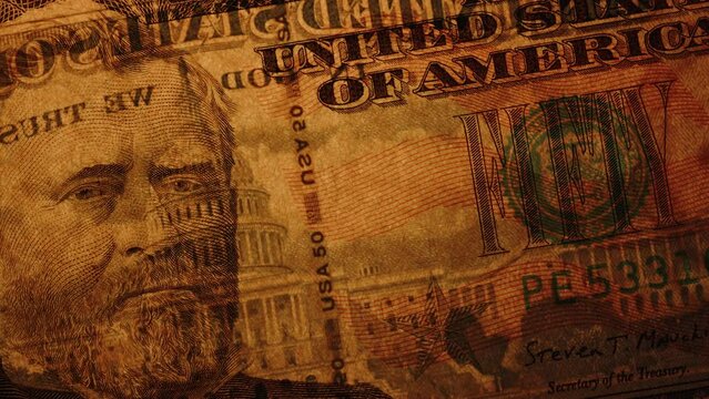 Fifty-Dollar Bill Illuminated By Light Showing Watermarks For Counterfeit Protection.