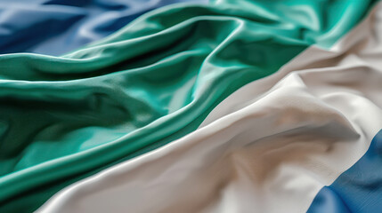 Obraz premium Beautiful Close up of Colorful Fabric with Gentle Waves in Green, Blue, and White High Resolution Texture Image for Backgrounds, Design, Fashion, or Artistic Inspiration