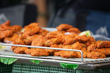 A tray of food with many pieces of food on it