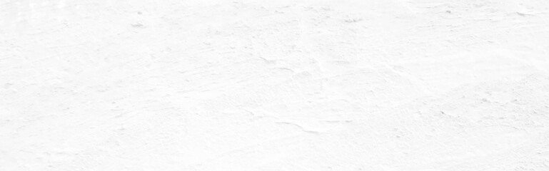 White old concrete wall grunge texture - wide banner format background with copy space for text. Grunge gray texture of chips, cracks, scratches, Soft white grunge.
