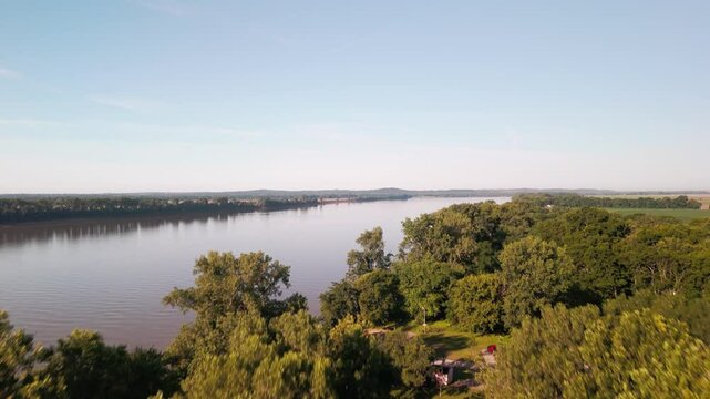 Drone footage of the Ohio River flowing through between Kentucky and Indiana in the United States