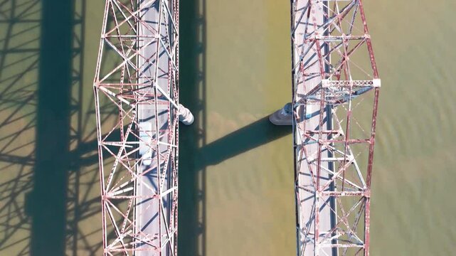 Drone footage of the Audubon Memorial Bridge spanning the Ohio River on a sunny day in United States