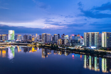 Aerial photography of the night scene on the east bank of the Xiangjiang River in Zhuzhou, China