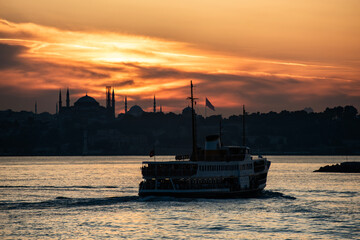 Obraz premium Ferry on Istanbul. Beautiful Istanbul sunset view. Istanbul, Turkey.