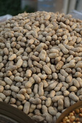 Heap of roasted peanut, Unpeel peanut selling on the roadside, Stack of ground peanut