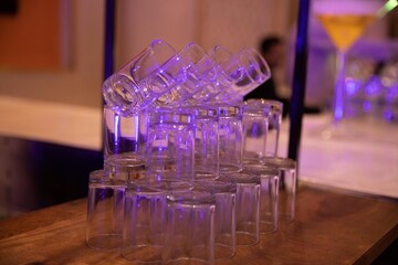 cocktails glasses laid down in a neat pattern in a club party. 