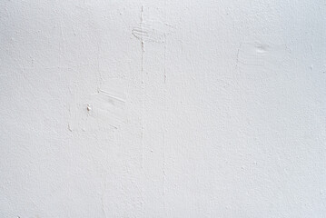 White rough cement wall background 