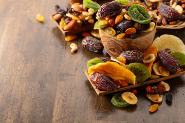 Dried tropical fruits with various nuts and raisins.