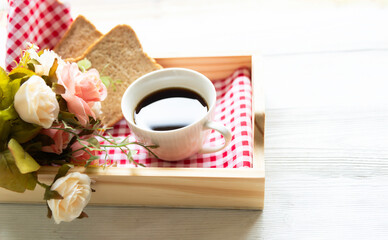 Glass cup with coffee and served with toasted bread  background Simple breakfast.